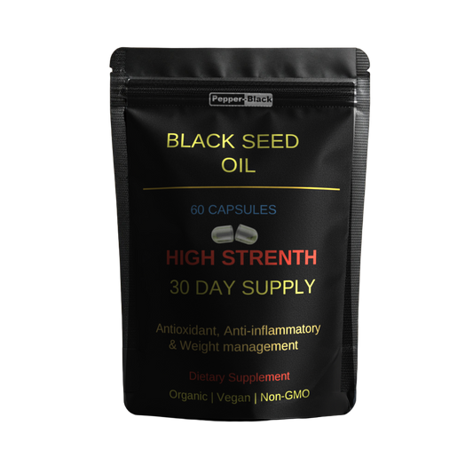 Black seed oil supplement package on a beige background