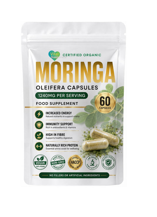 A stand-up pouch of Vitality Certified Organic Moringa Oleifera Capsules on a plain white background. The packaging is white with green and gold text and graphics, showing a capsule and green leaves.