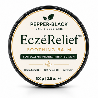 A round tin of Pepper-Black EczéRelief Soothing Balm, featuring a cream-colored label with green and gold text and a black rim, set against a plain white background.